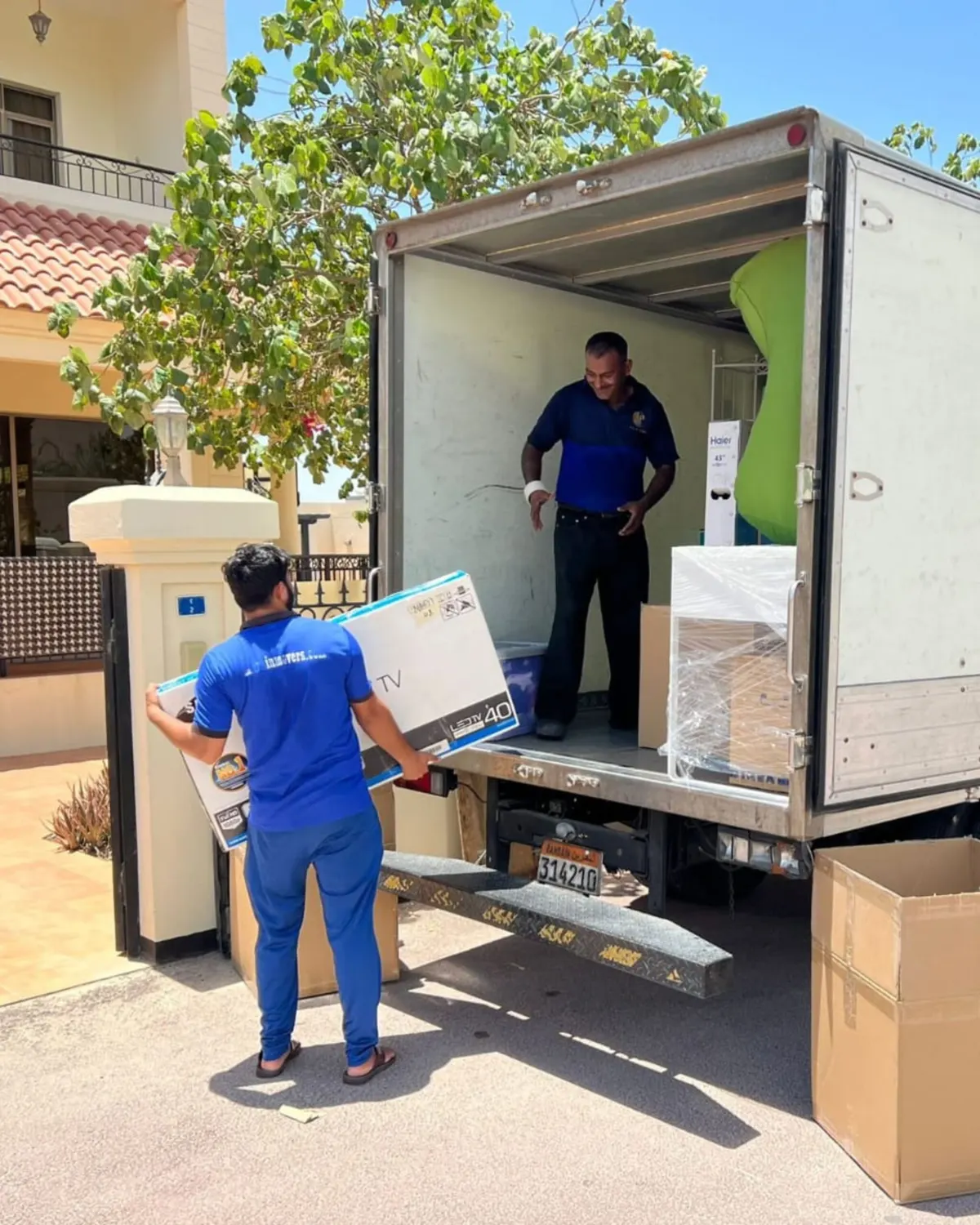 Safe & Perfect crew loading a moving truck